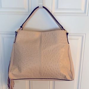 Brand new G.I.L.I. GENUINE LEATHER BAG w/TASSEL .